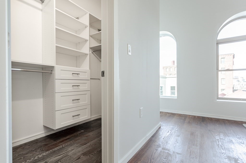 178 Elm Street, Unit 5 Cambridge, MA 02139 - Photo 13 of 14 an empty room with windows and closet