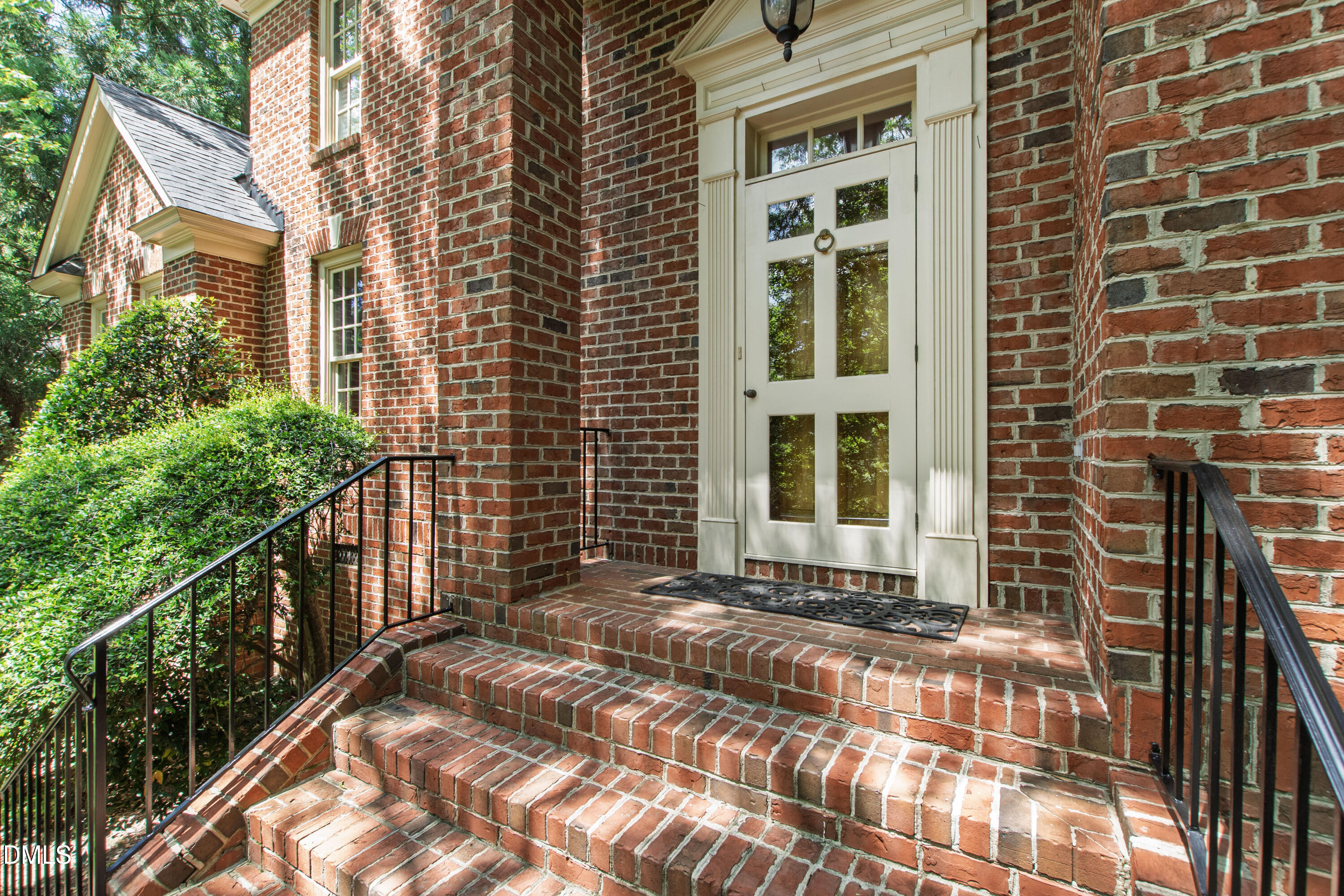 3708 Lubbock Drive Raleigh, NC 27612 - Photo 64 of 64 a view of a brick house with a large window