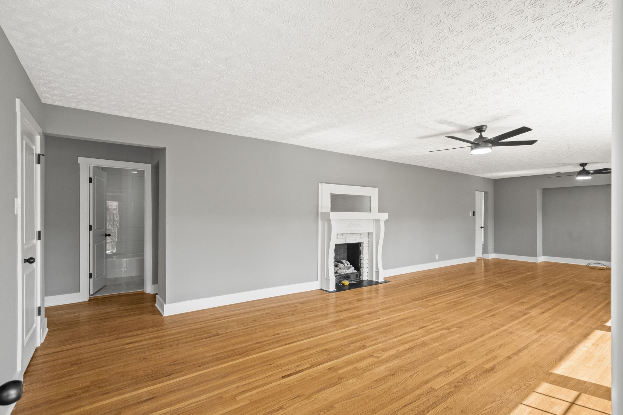 1503 5th Avenue West Springfield, TN 37172 - Photo 11 of 57 a view of empty room with wooden floor and fan