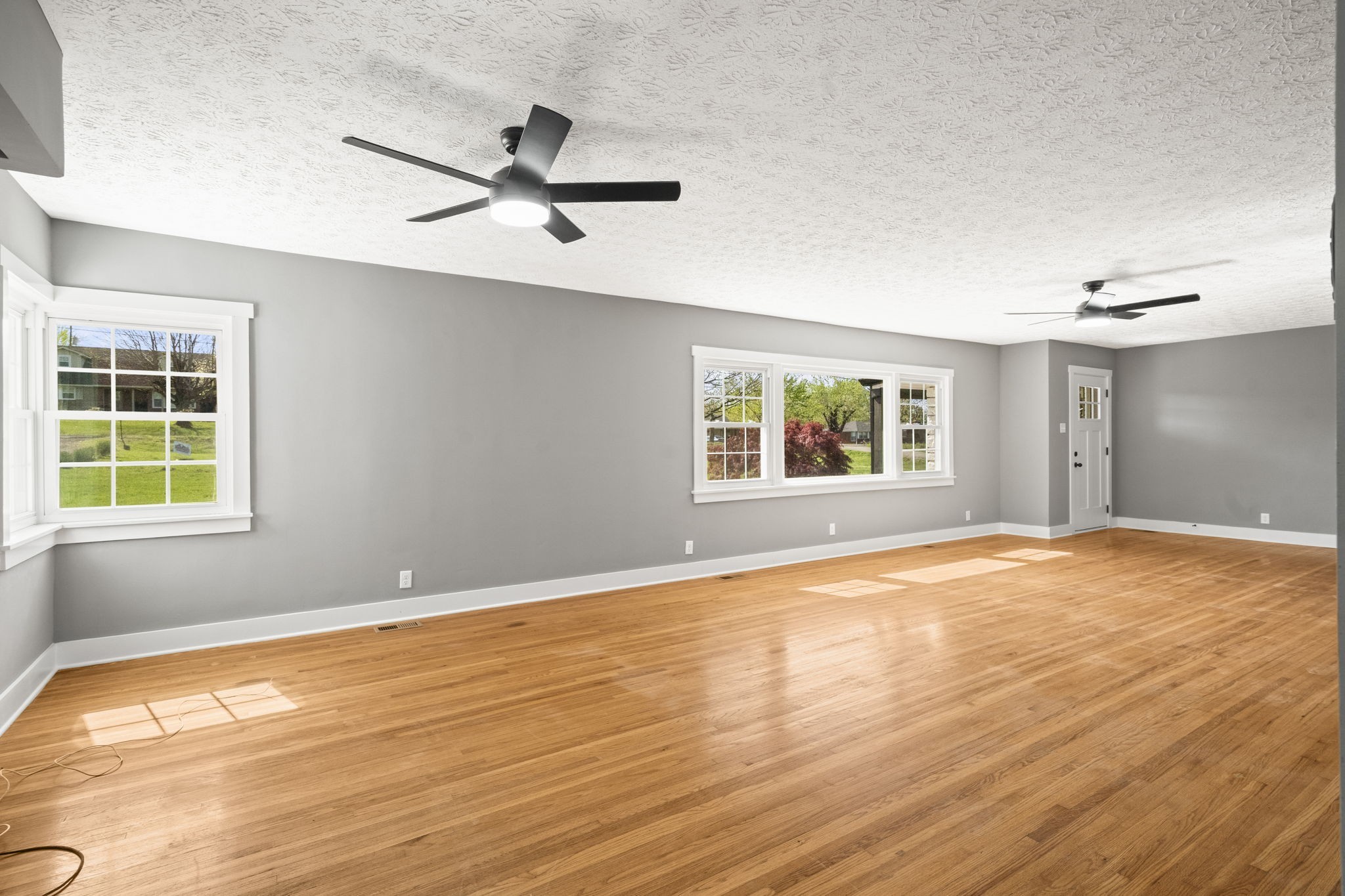 1503 5th Avenue West Springfield, TN 37172 - Photo 15 of 57 a view of an empty room with a window and wooden floor