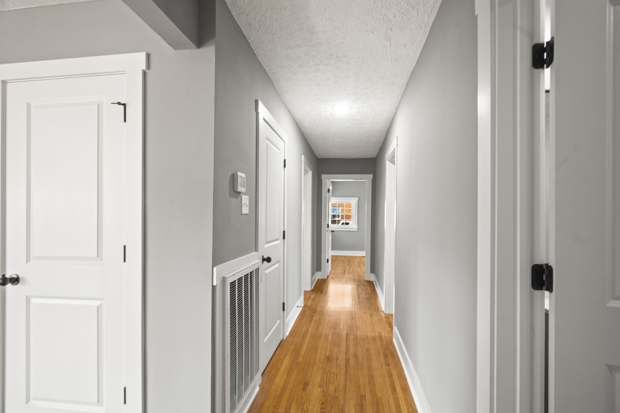 1503 5th Avenue West Springfield, TN 37172 - Photo 16 of 57 a view of a hallway with wooden floor and staircase