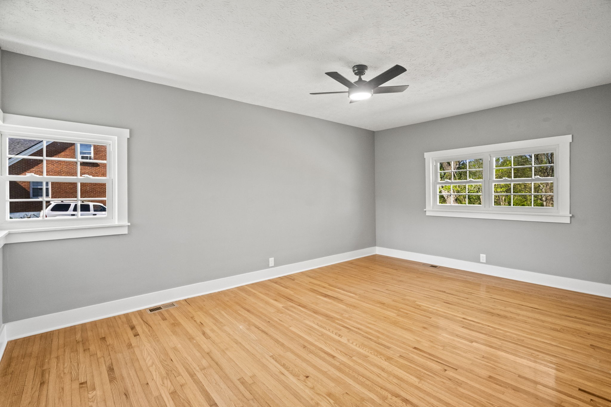1503 5th Avenue West Springfield, TN 37172 - Photo 21 of 57 a view of an empty room with wooden floor and a window