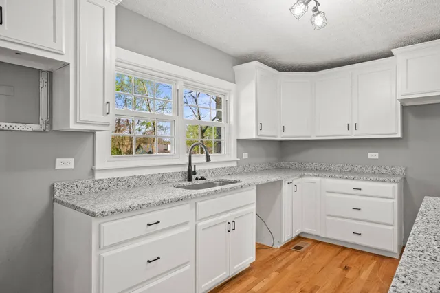 a view of closet area with empty racks