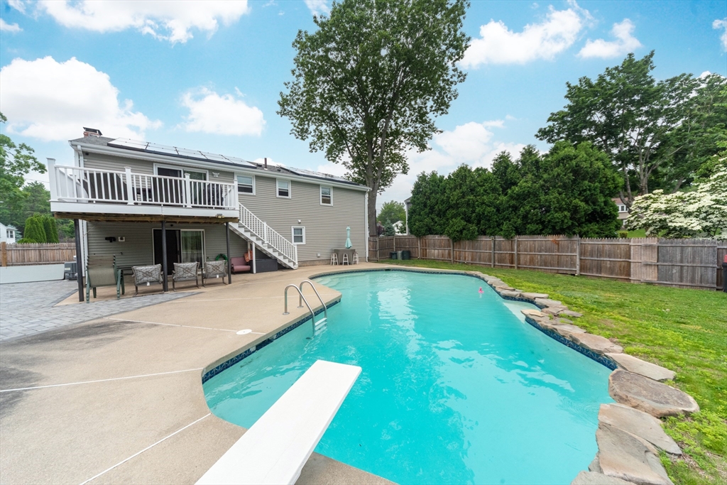 13 Westgate Road Framingham, MA 01701 - Photo 20 of 24 a view of a house with swimming pool and sitting area