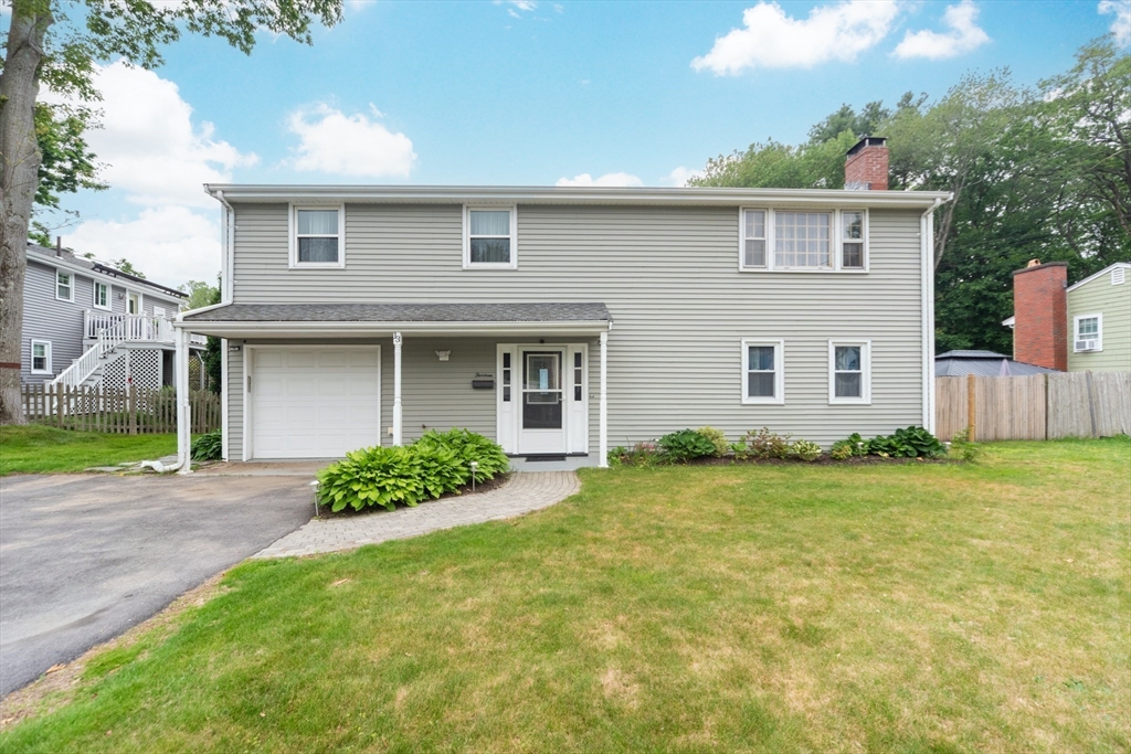 13 Westgate Road Framingham, MA 01701 - Photo 3 of 24 a front view of house with yard and green space