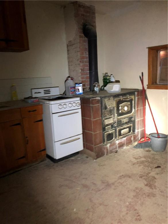 0 County Road 15 Road Como, CO 80432 - Photo 9 of 27 a kitchen with stainless steel appliances a stove and a sink