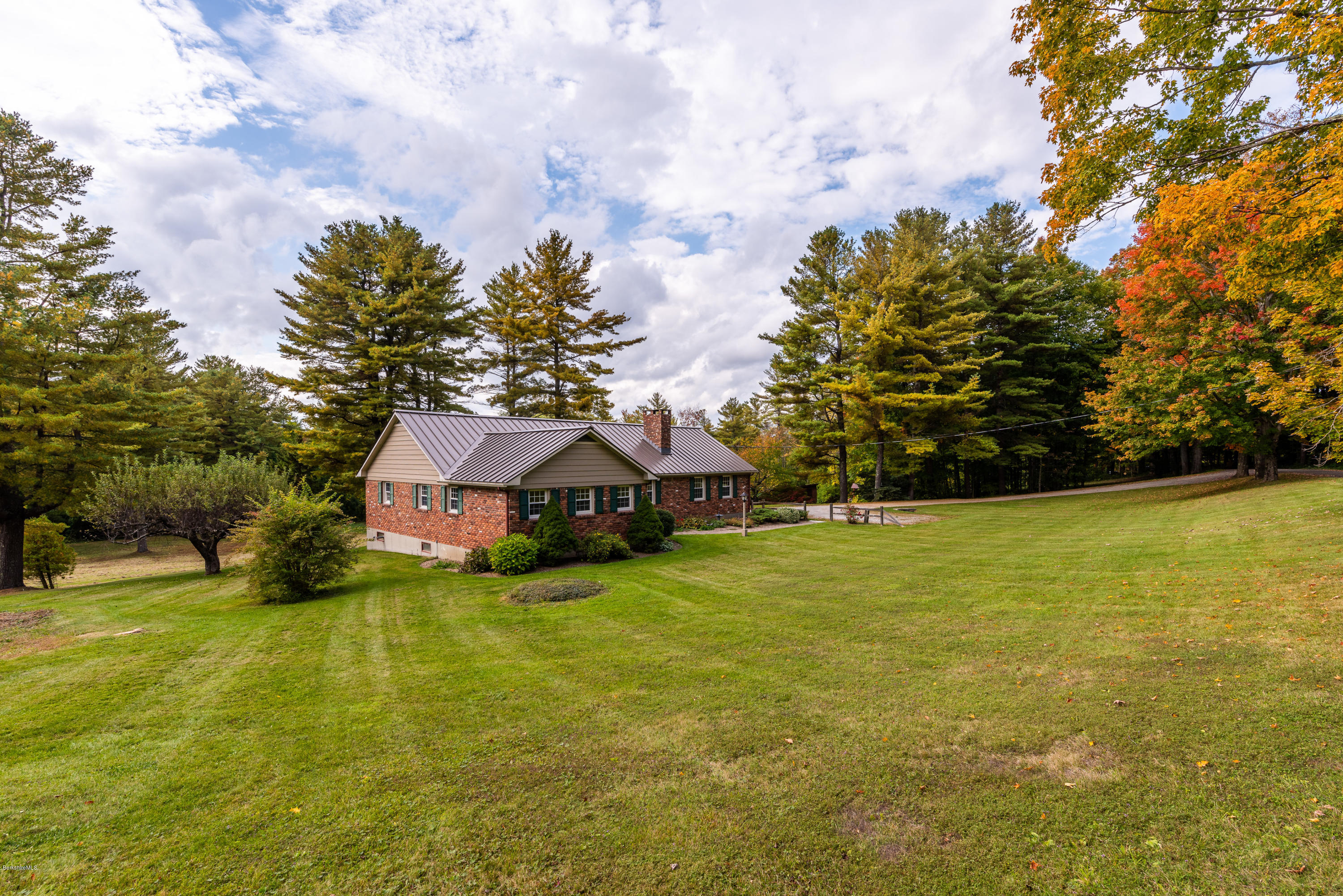 552 E Road Richmond, MA 01254 - Photo 3 of 42 a house with a field in front of it