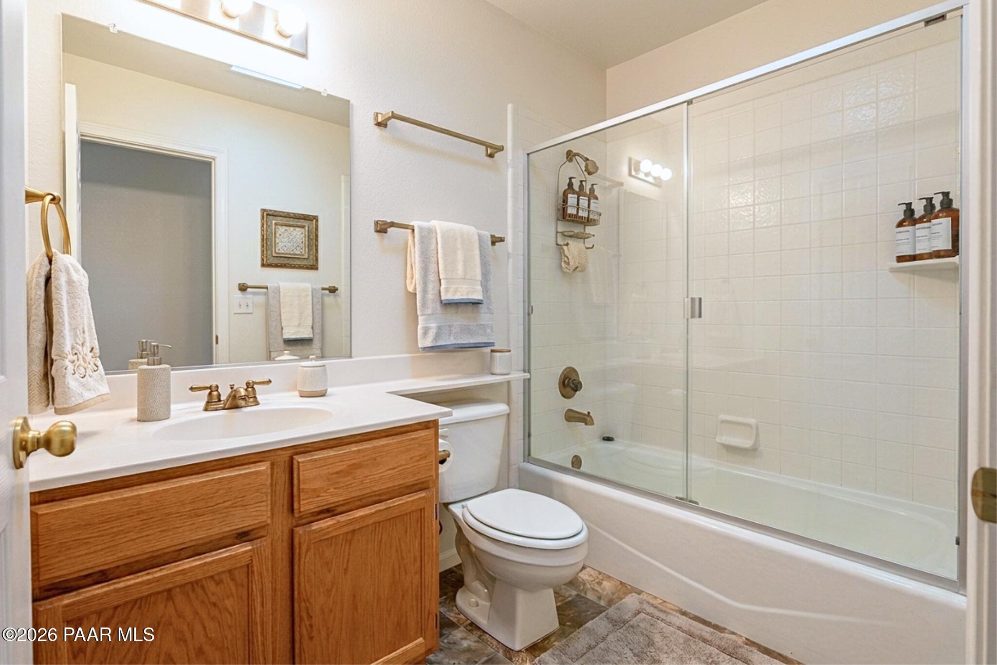 908 Rolling Green Road Dewey, AZ 86327 - Photo 12 of 13 a bathroom with a sink a toilet and shower