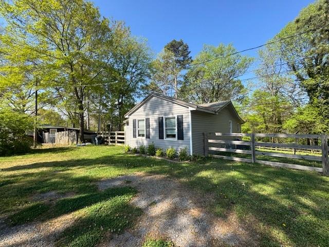 45 Jackson Drive Southeast Cartersville, GA 30121 - Photo 3 of 17 a front view of a house with a yard