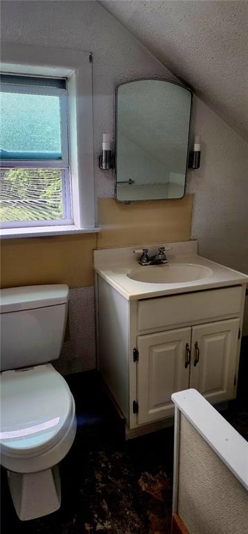 903 Clearfield Road Fenelton, PA 16034 - Photo 12 of 25 a bathroom with a toilet sink and mirror