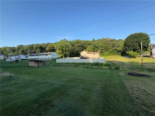 a view of a garden with an outdoor space