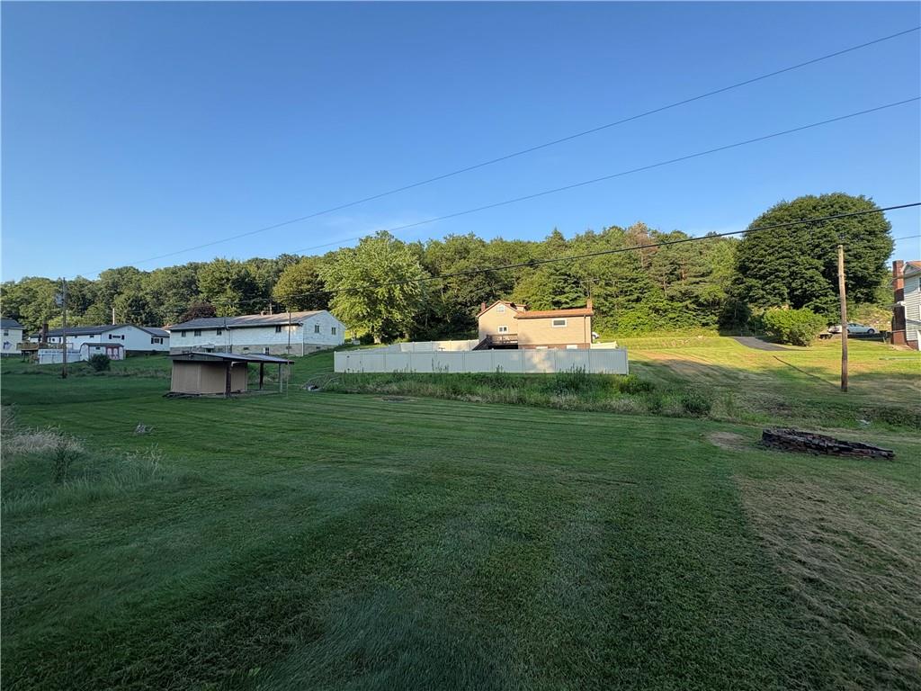 903 Clearfield Road Fenelton, PA 16034 - Photo 19 of 25 a view of a garden with an outdoor space