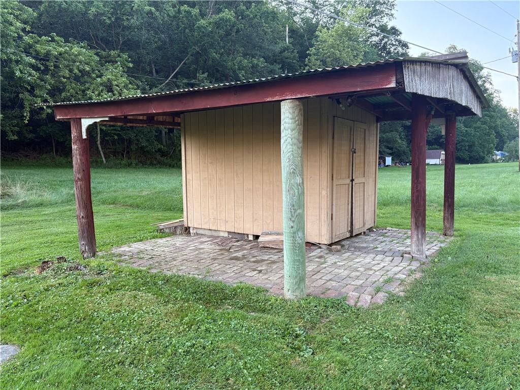 903 Clearfield Road Fenelton, PA 16034 - Photo 20 of 25 a view of a house with a yard