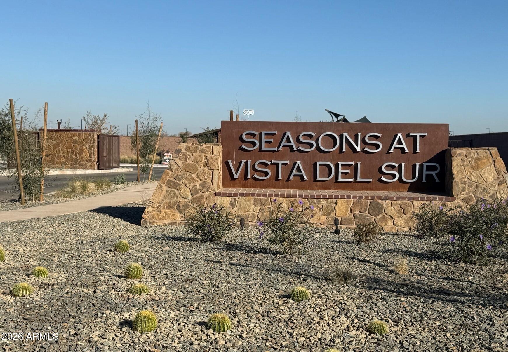 9810 West Fraktur Road Tolleson, AZ 85353 - Photo 2 of 3 a sign board with parking space