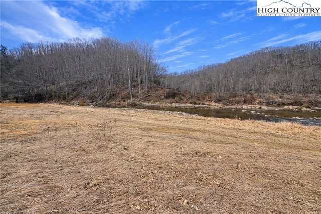 a view of side of snow with a yard