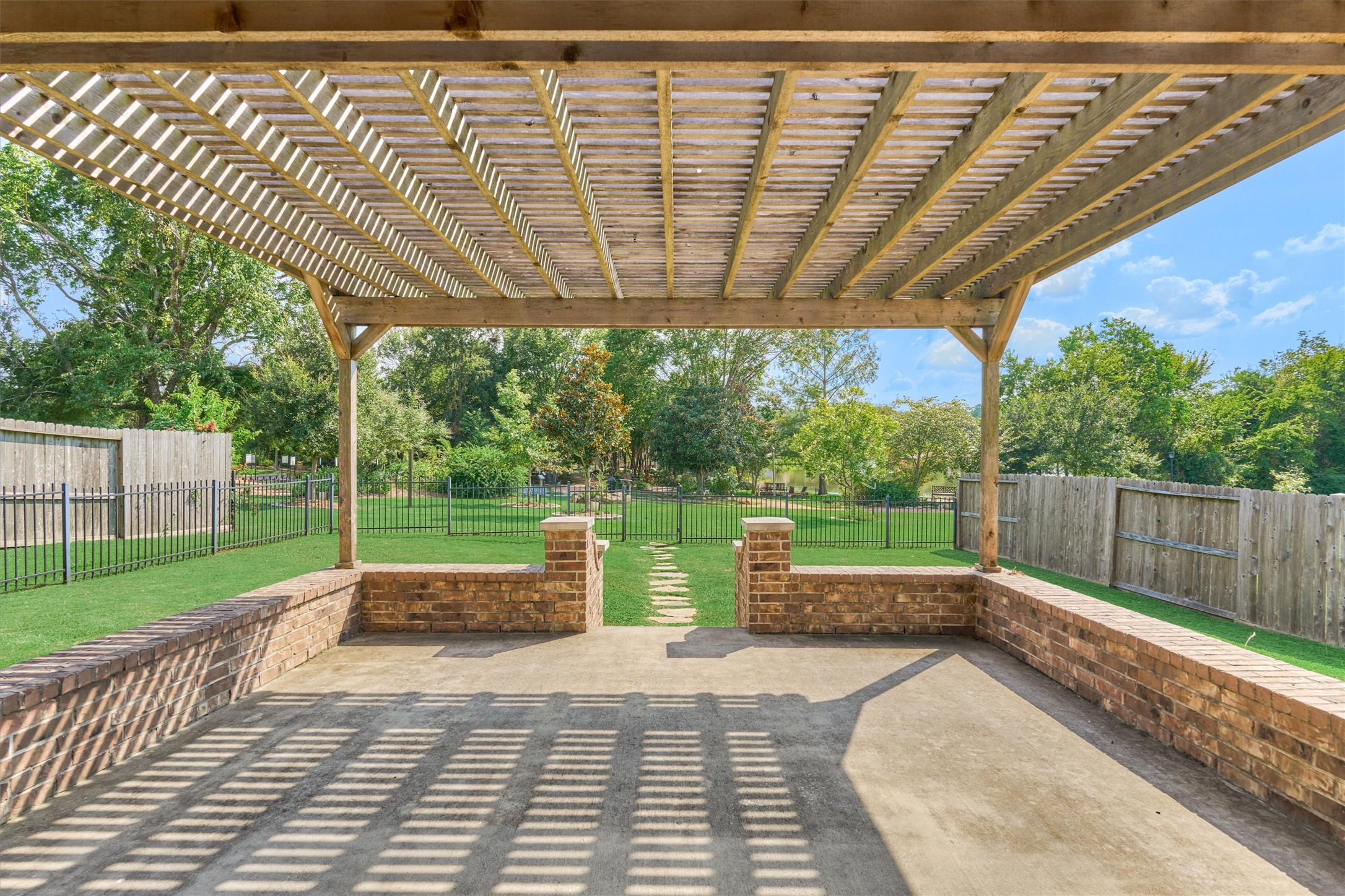 180 Racetrack Lane Montgomery, TX 77356 - Photo 2 of 46 Views of Memory Park and the pond beyond from your back patio and pergola.