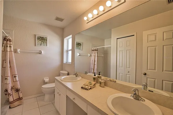 a view of a dining room with furniture wooden floor and chandelier