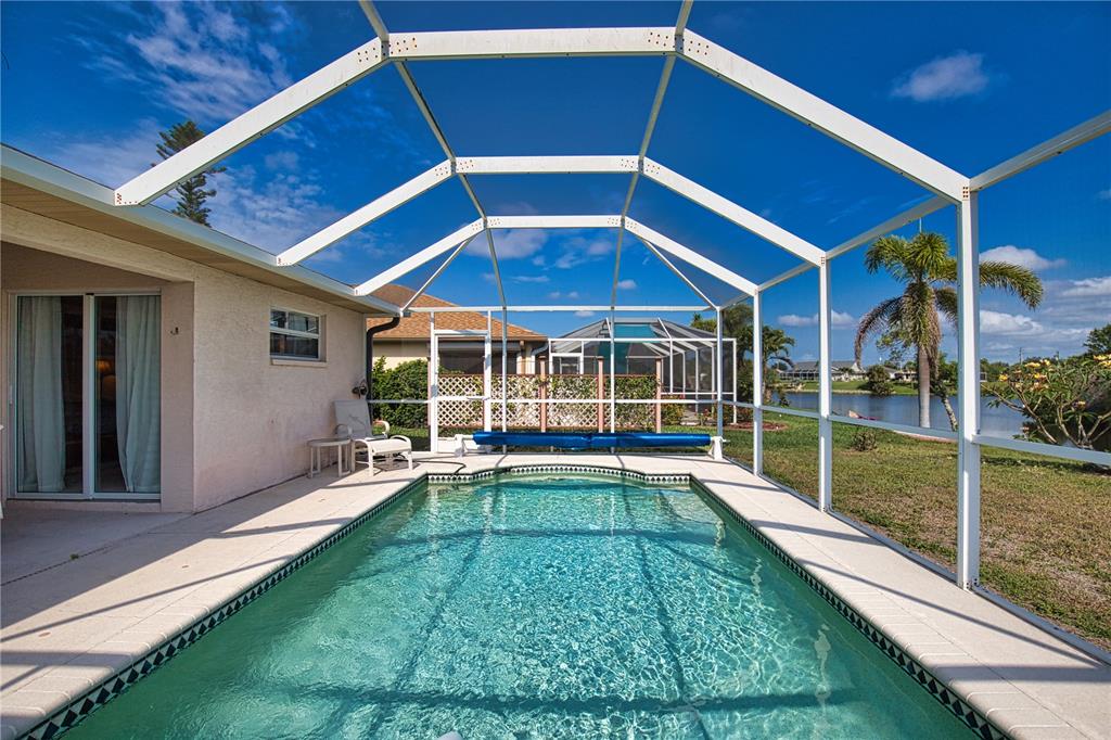 116 Albatross Road Rotonda West, FL 33947 - Photo 25 of 28 a view of swimming pool with seating area