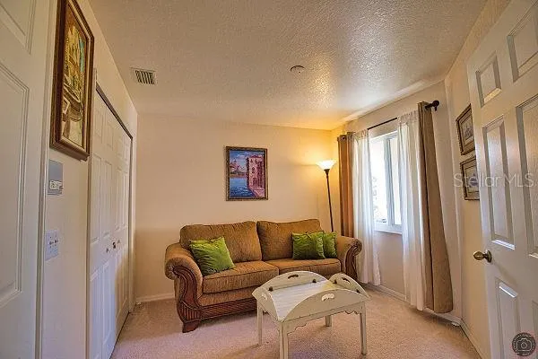 a kitchen with stainless steel appliances a stove a sink and a microwave