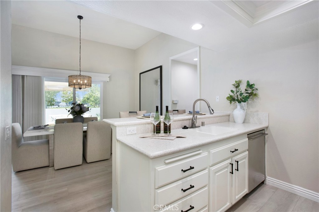 19 Spinnaker Irvine, CA 92614 - Photo 13 of 63 a bathroom with a double vanity sink and mirror