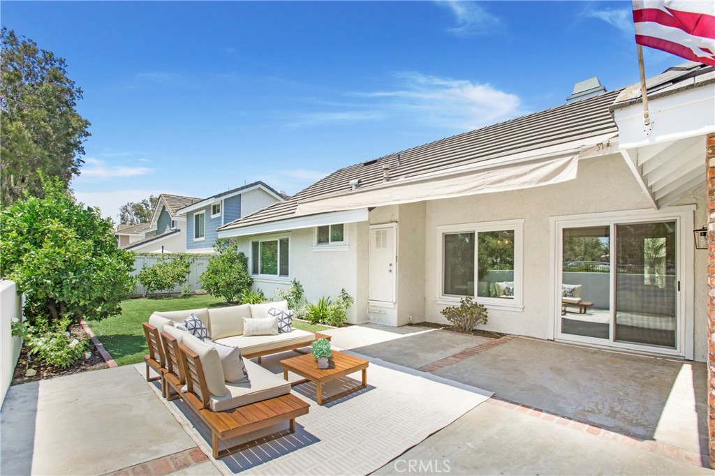 19 Spinnaker Irvine, CA 92614 - Photo 23 of 63 a view of a house with backyard and sitting area