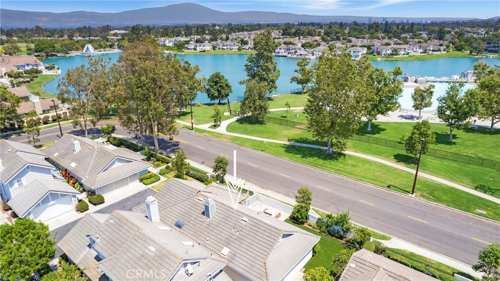 19 Spinnaker Irvine, CA 92614 - Photo 26 of 63 an aerial view of a house with a lake view