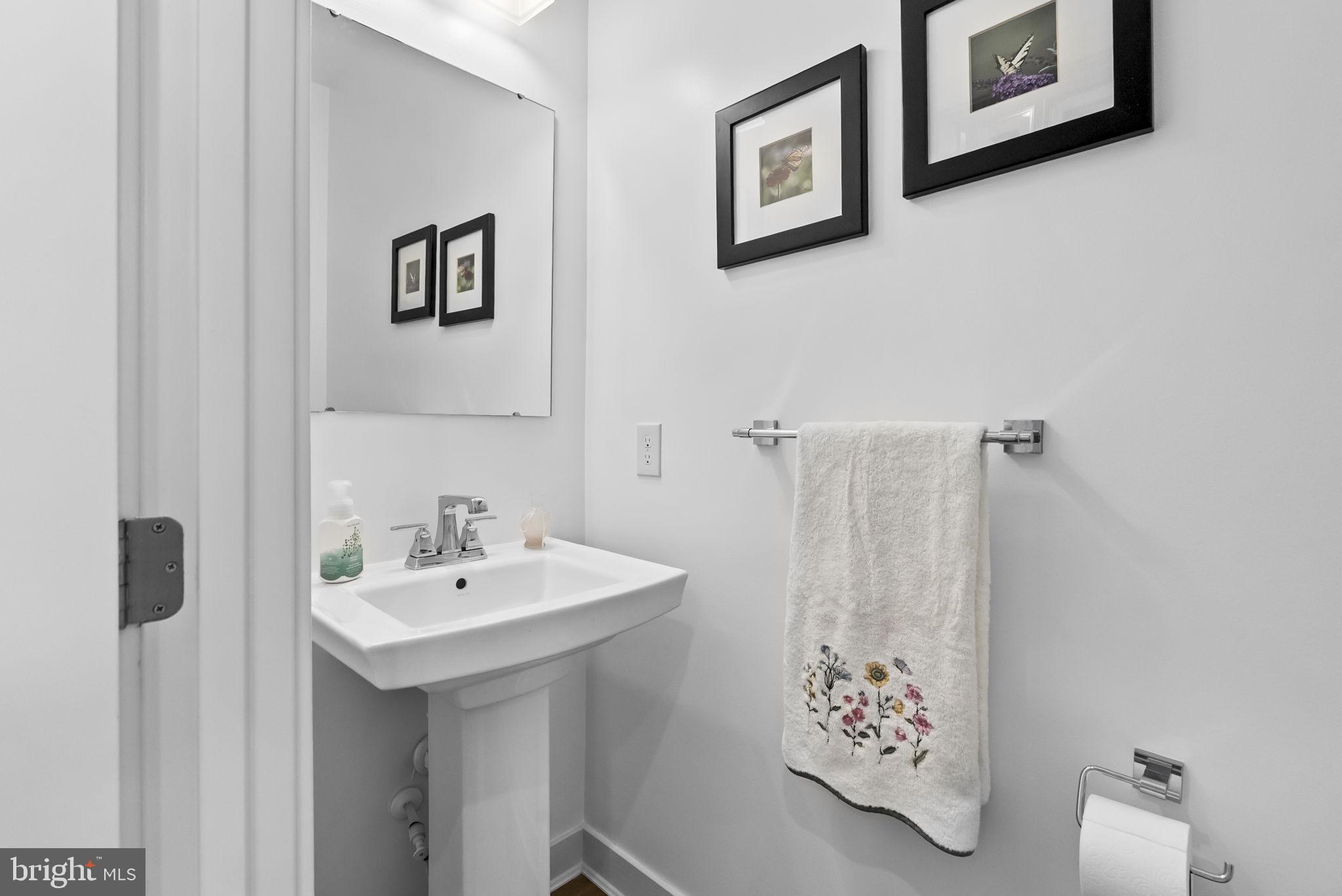 112 Frame Drive Coatesville, PA 19320 - Photo 12 of 55 a bathroom with a sink and mirror