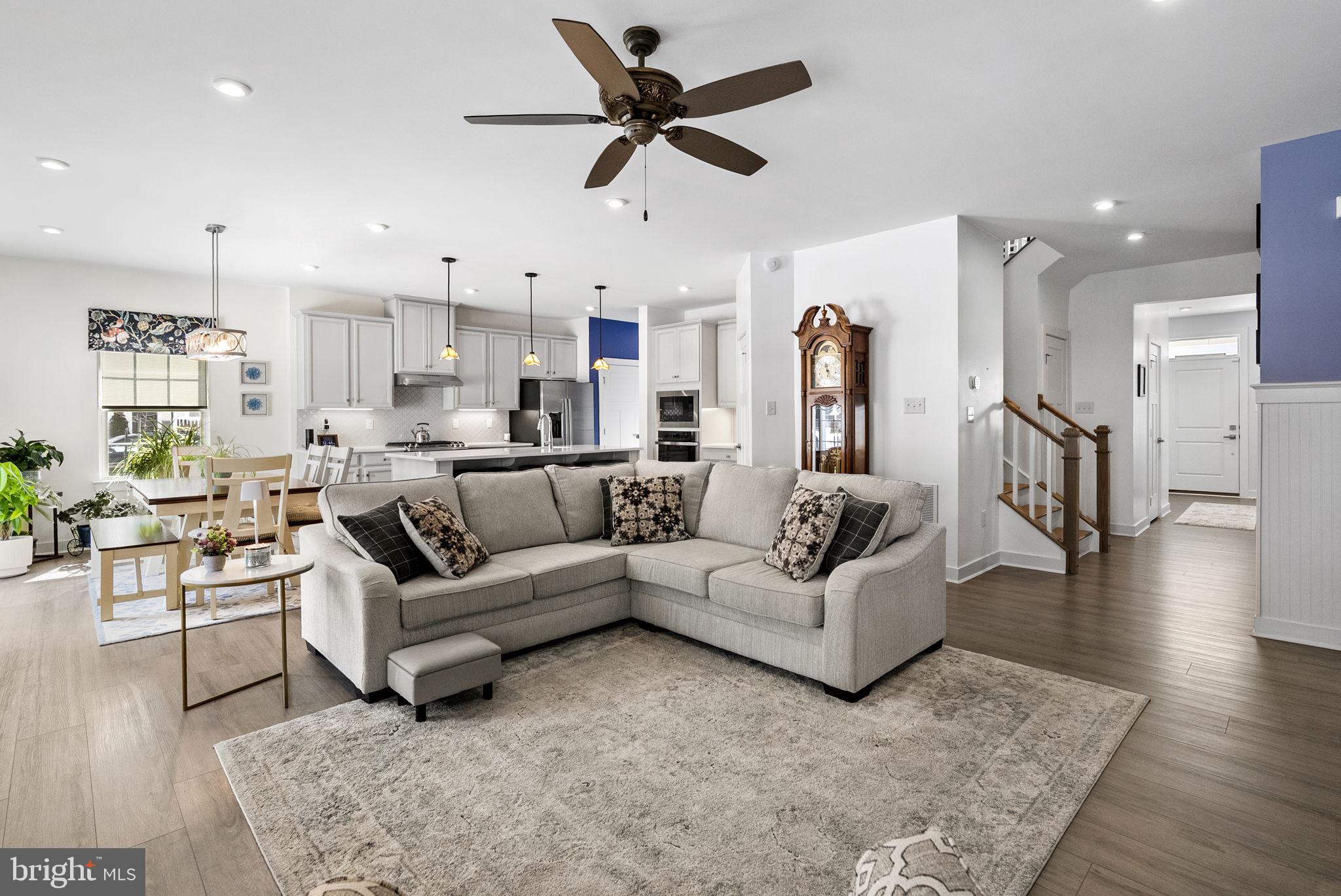 112 Frame Drive Coatesville, PA 19320 - Photo 13 of 55 a living room with furniture and a view of kitchen
