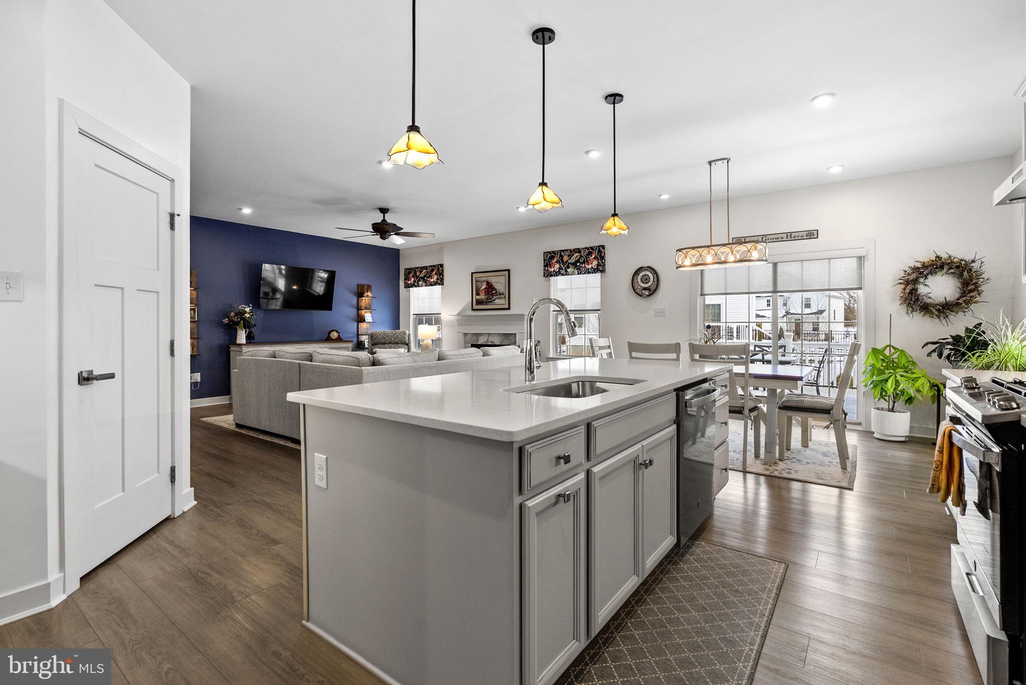 112 Frame Drive Coatesville, PA 19320 - Photo 19 of 55 a kitchen with a sink stove and wooden floor