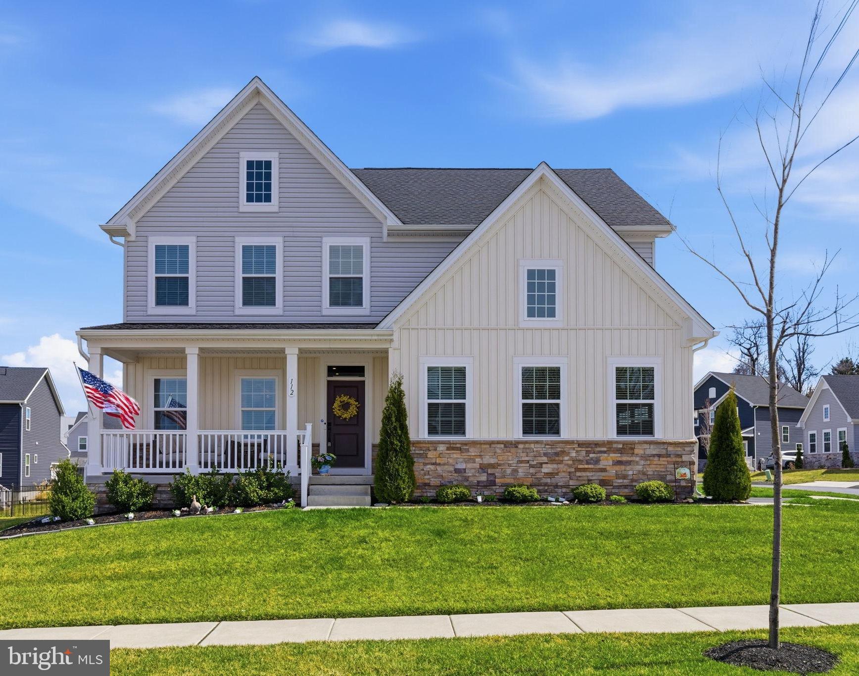 112 Frame Drive Coatesville, PA 19320 - Photo 2 of 55 a front view of a house with a yard