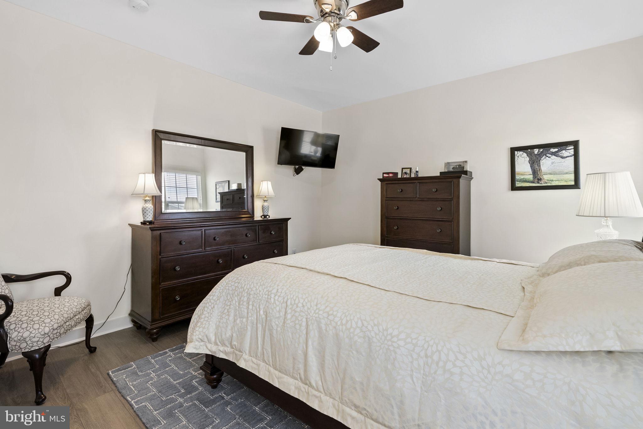 112 Frame Drive Coatesville, PA 19320 - Photo 26 of 55 a bedroom with a bed and a dresser