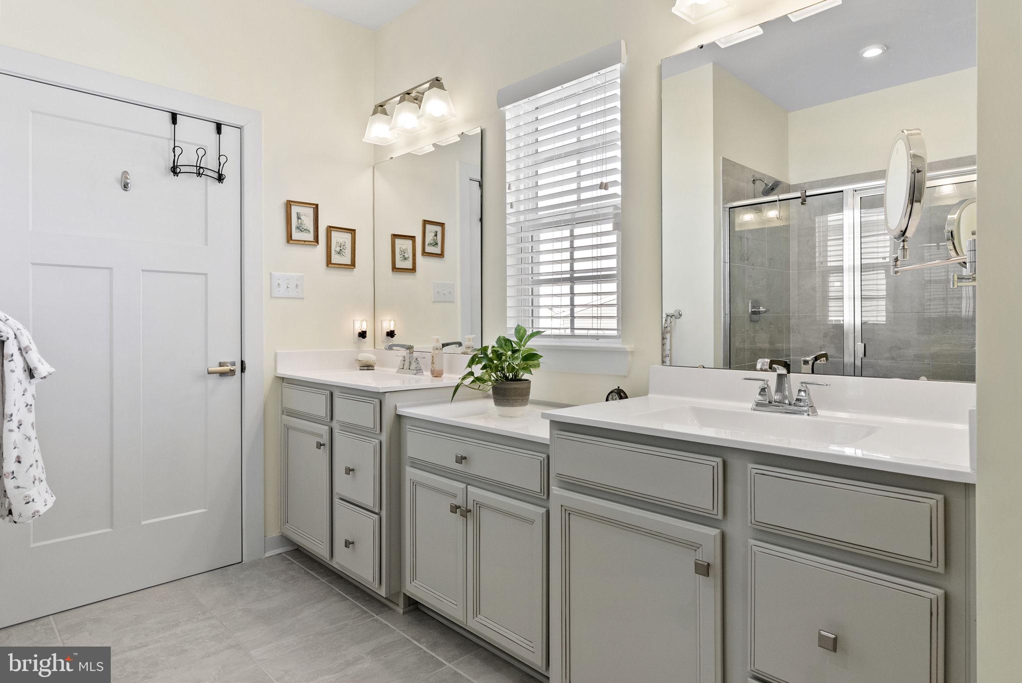 112 Frame Drive Coatesville, PA 19320 - Photo 27 of 55 a bathroom with a double vanity sink mirror and double