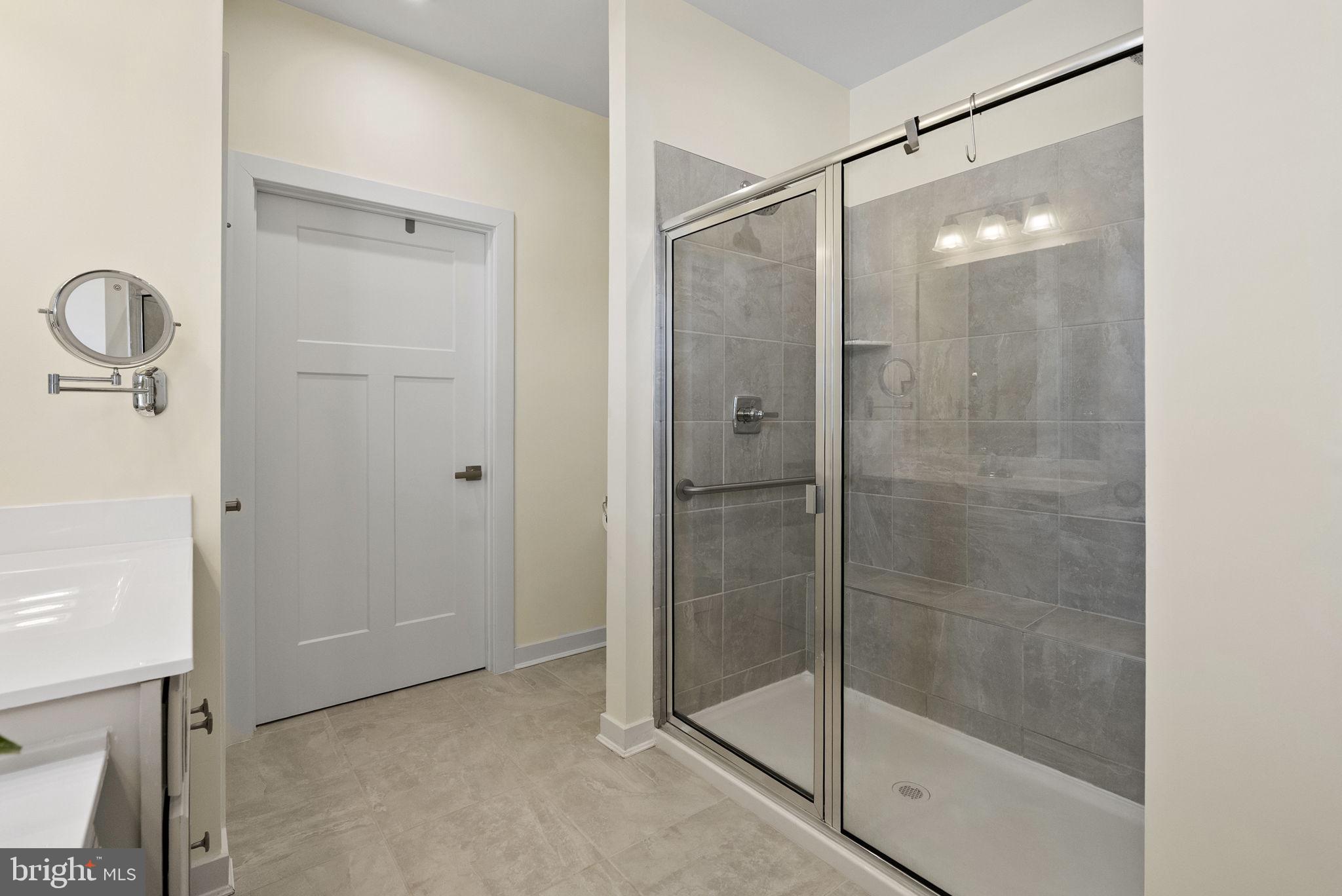 112 Frame Drive Coatesville, PA 19320 - Photo 28 of 55 a bathroom that has a glass shower door