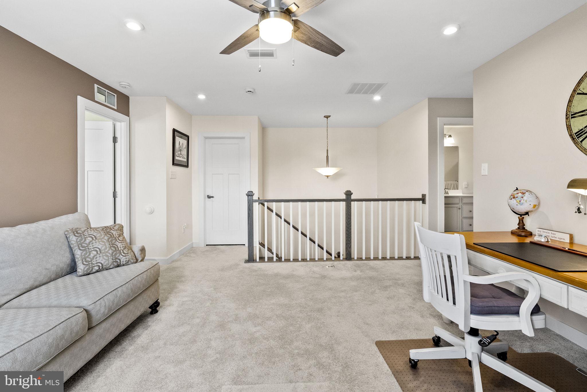 112 Frame Drive Coatesville, PA 19320 - Photo 30 of 55 a living room with furniture and a table