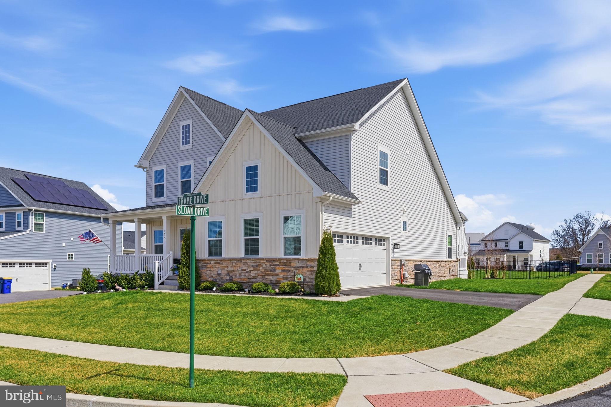 112 Frame Drive Coatesville, PA 19320 - Photo 3 of 55 a front view of a house with a yard