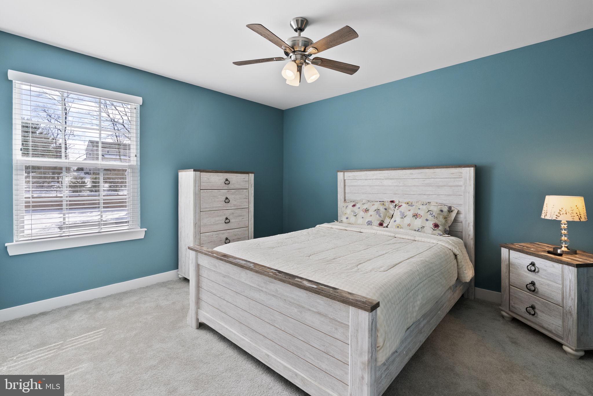 112 Frame Drive Coatesville, PA 19320 - Photo 32 of 55 a bedroom with a bed and a large bed dresser
