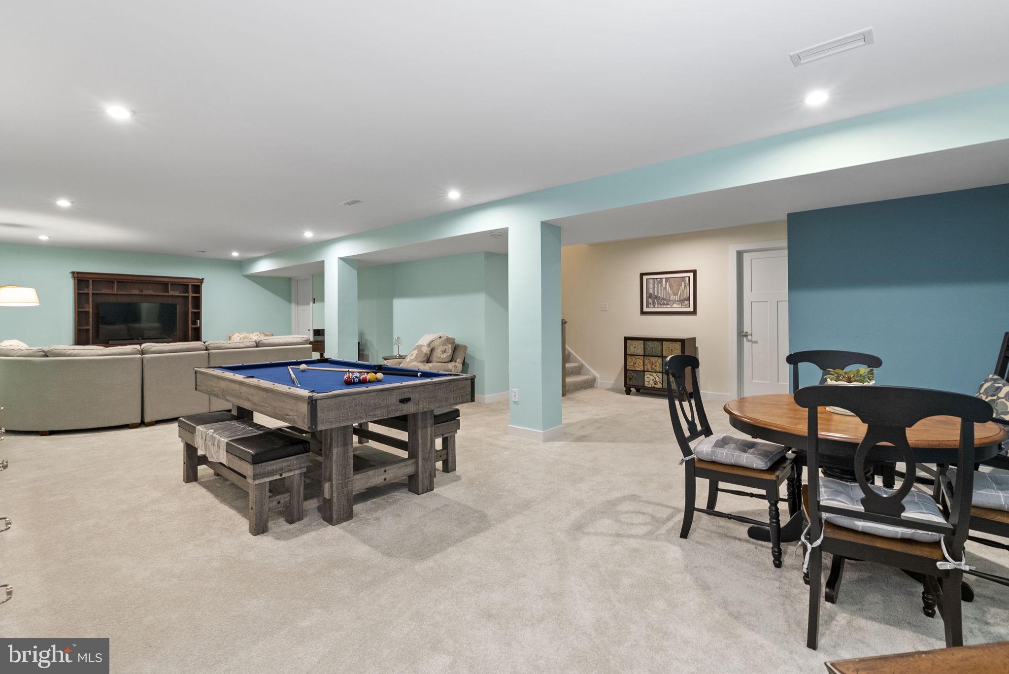 112 Frame Drive Coatesville, PA 19320 - Photo 36 of 55 a living room with furniture and a flat screen tv
