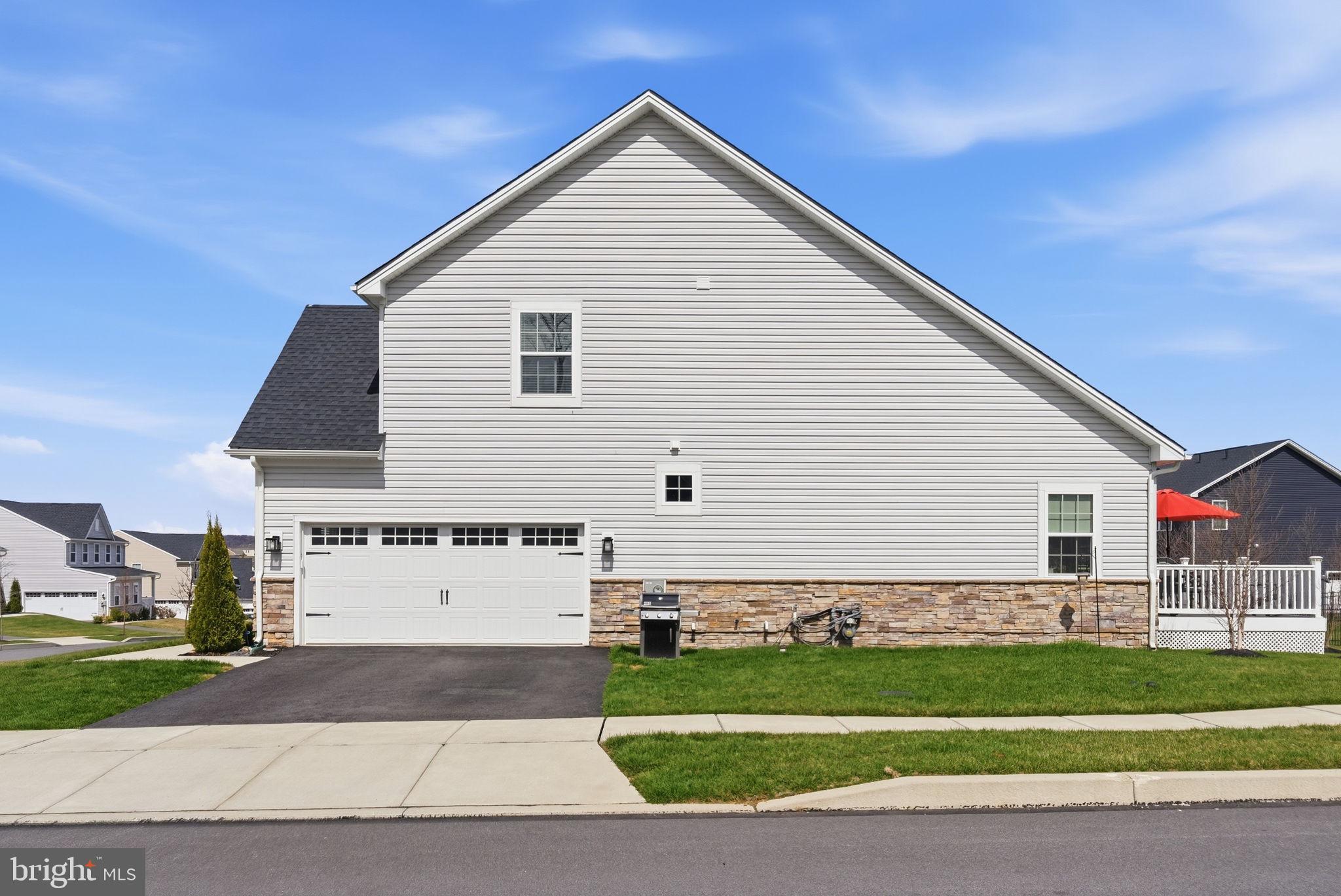112 Frame Drive Coatesville, PA 19320 - Photo 39 of 55 a view of a house with a yard and garage