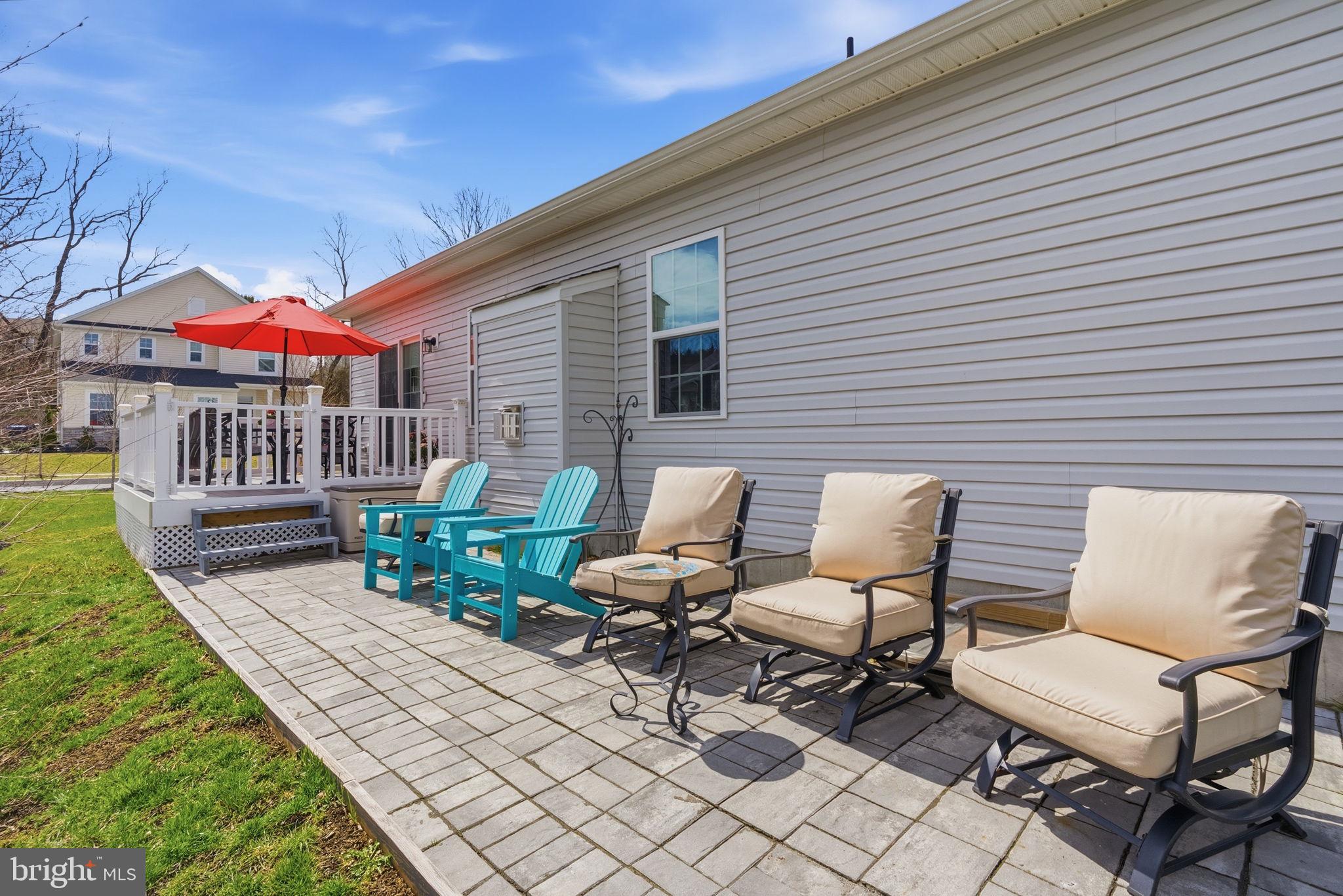 112 Frame Drive Coatesville, PA 19320 - Photo 44 of 55 a view of a chairs and table in backyard