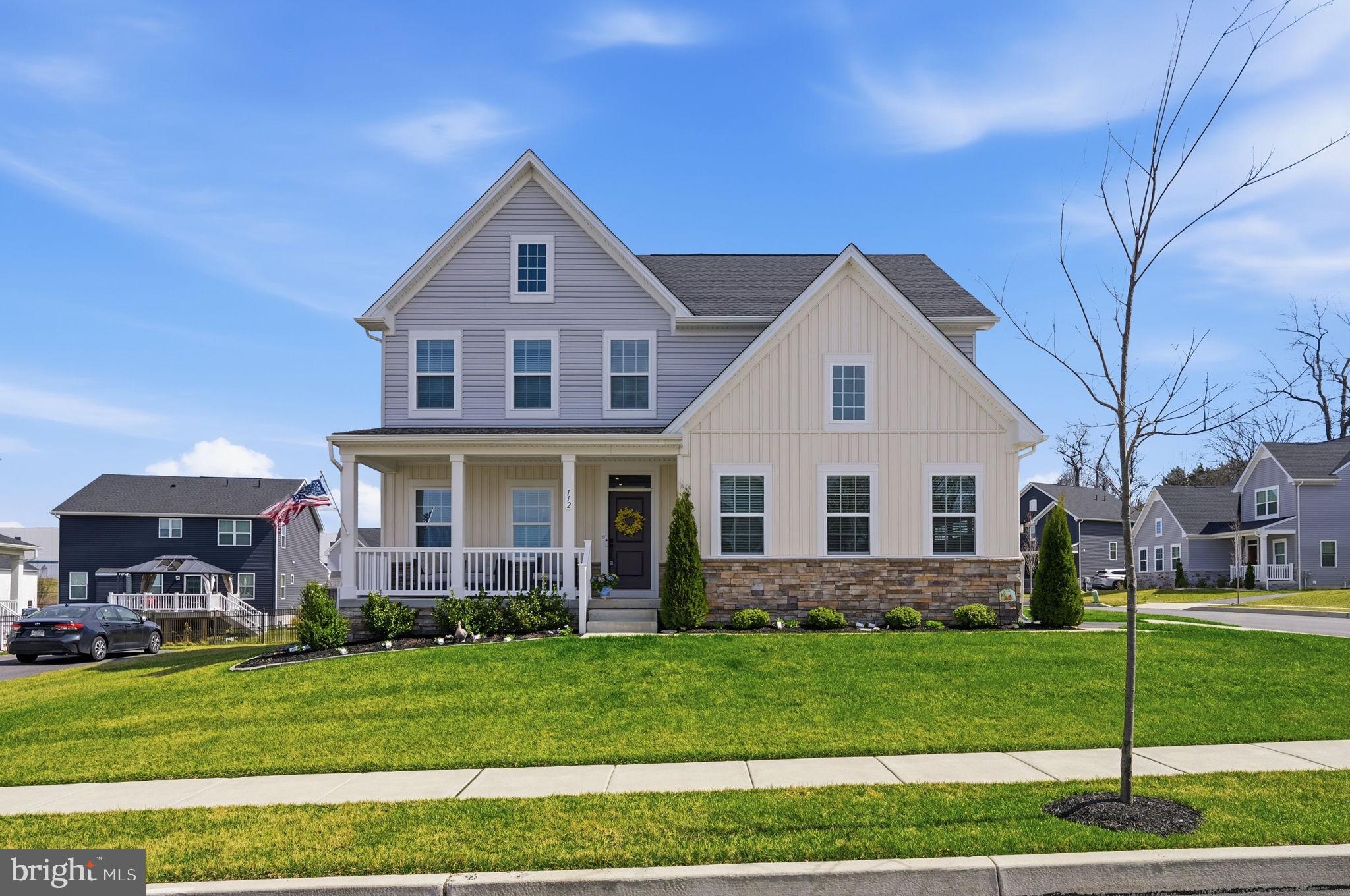 112 Frame Drive Coatesville, PA 19320 - Photo 47 of 55 a front view of a house with a garden