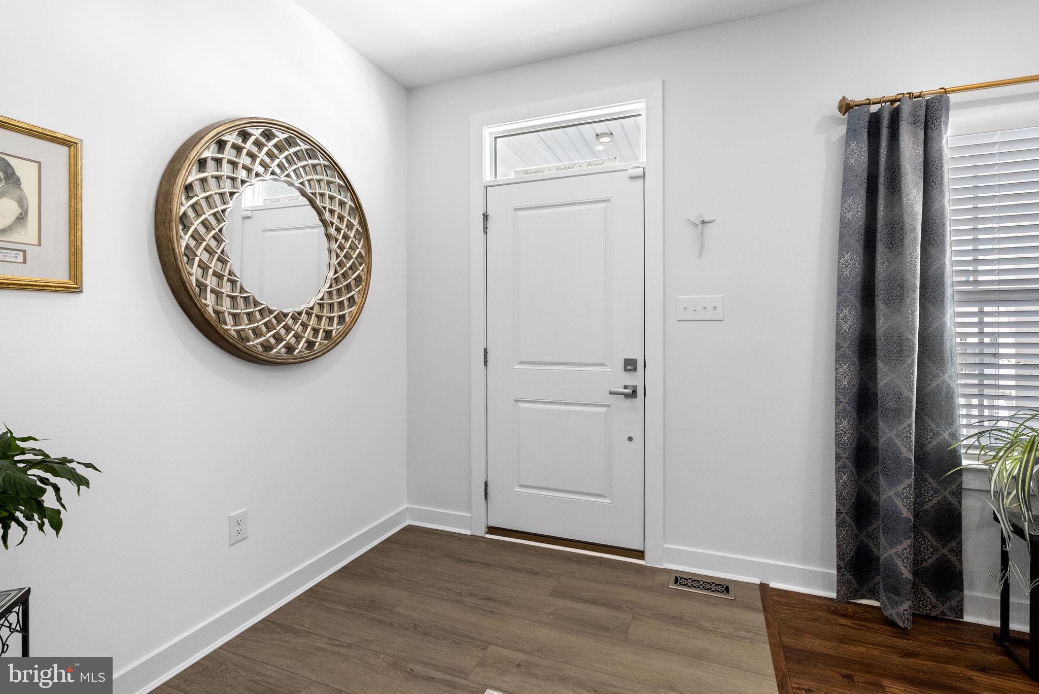 112 Frame Drive Coatesville, PA 19320 - Photo 7 of 55 an view of an entryway with wooden floor