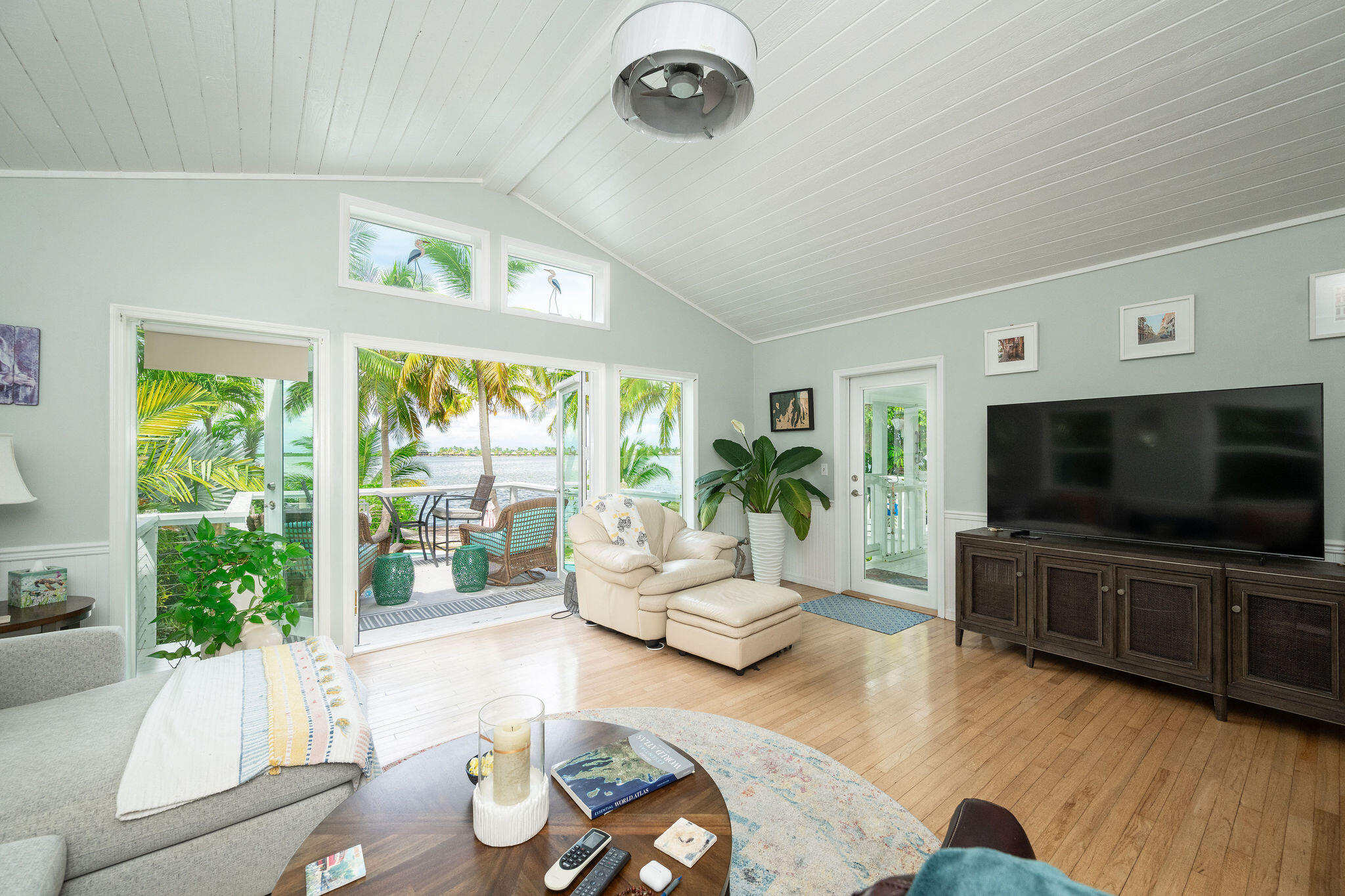 78 Bay Drive Key West, FL 33040 - Photo 24 of 116 a living room with furniture and a flat screen tv