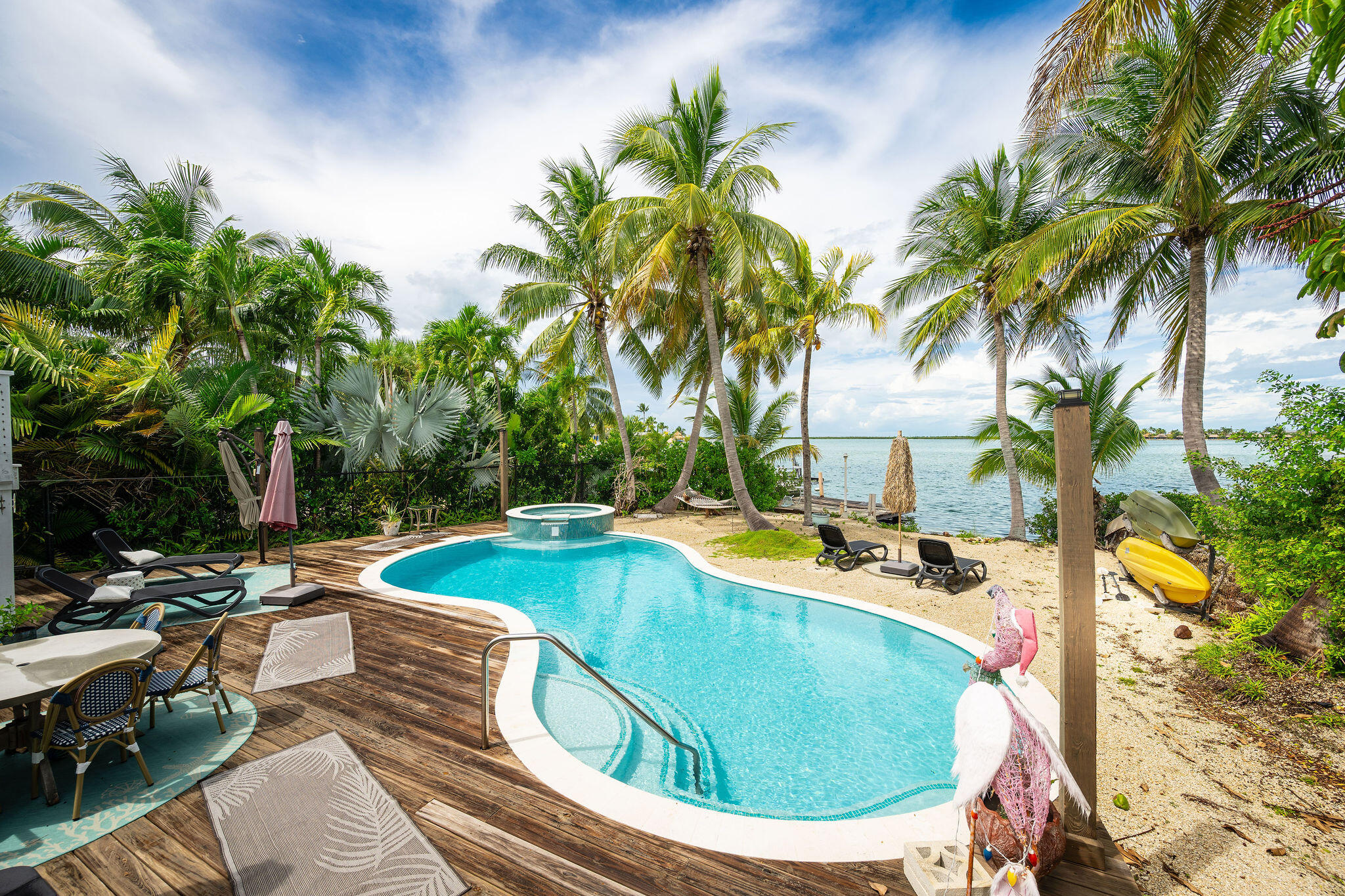78 Bay Drive Key West, FL 33040 - Photo 49 of 116 a view of a swimming pool with a patio