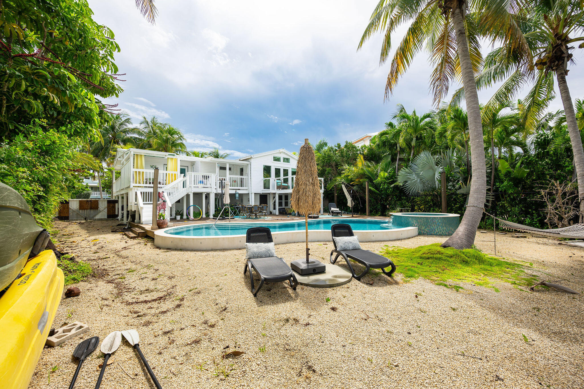 78 Bay Drive Key West, FL 33040 - Photo 60 of 116 a view of swimming pool with lounge chair
