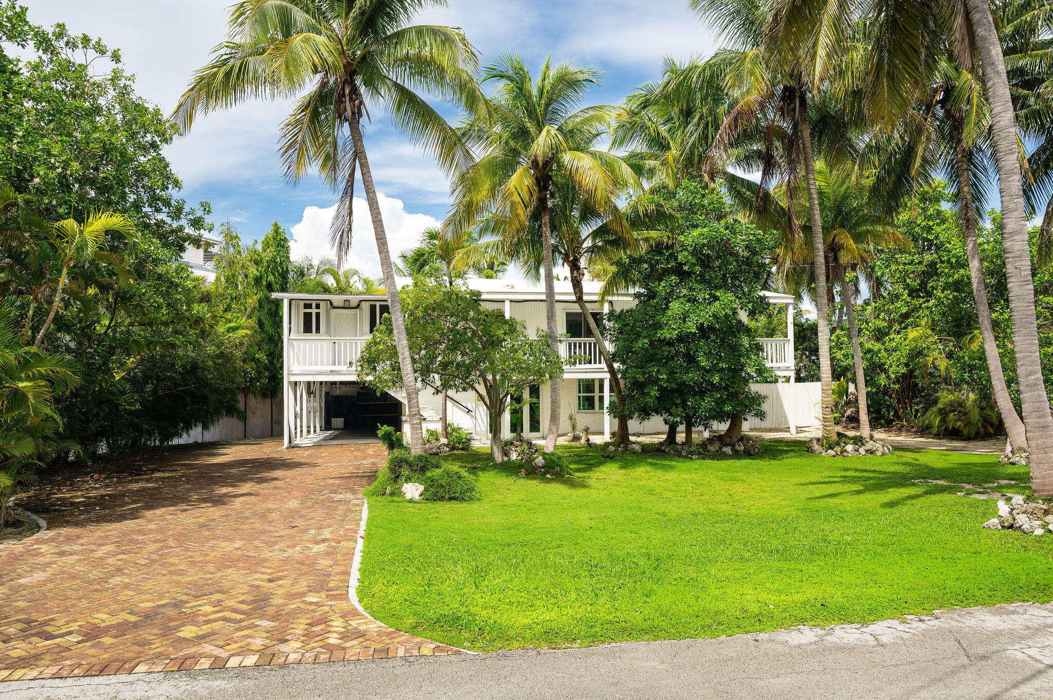78 Bay Drive Key West, FL 33040 - Photo 9 of 116 a view of a backyard with a garden