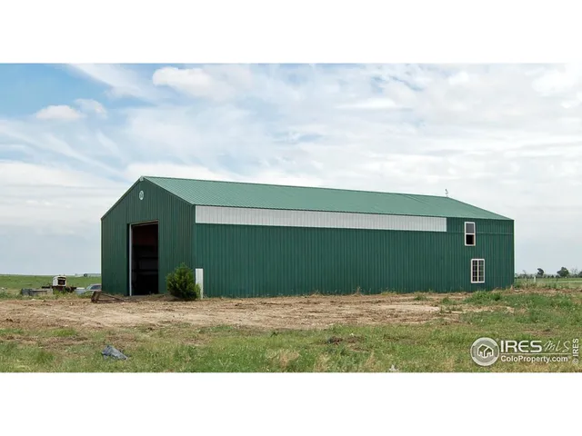 a black and white photo of a big room