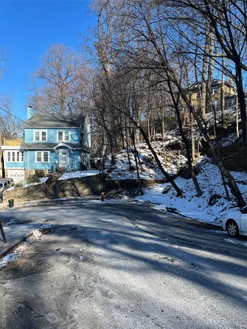 a view of street with houses