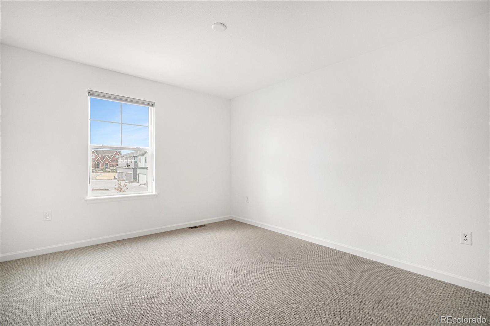 18235 Caffey Drive Parker, CO 80134 - Photo 26 of 38 an empty room with a window