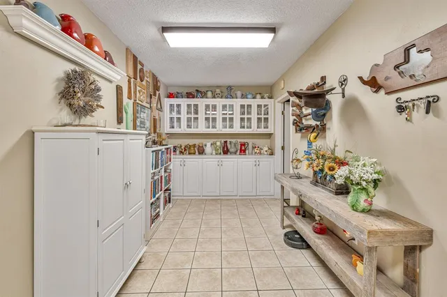 a view of a storage and utility room with washer and dryer
