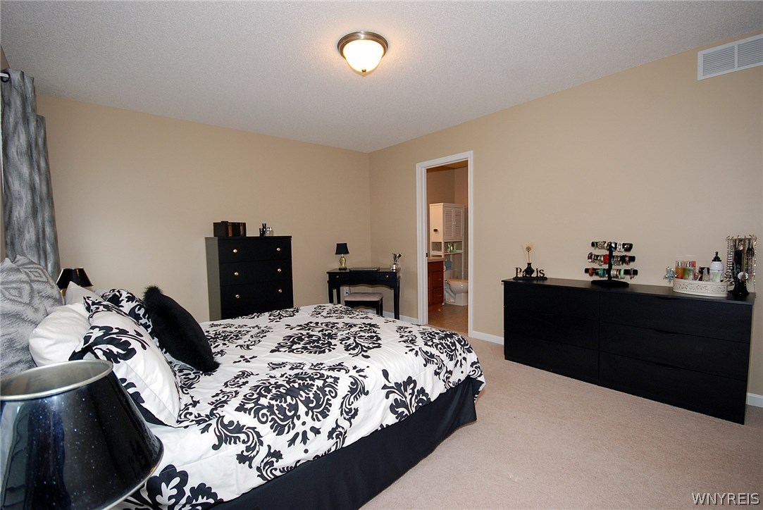 65 Hanover Street Lancaster, NY 14086 - Photo 15 of 25 Master bedroom. Door leads to full bath